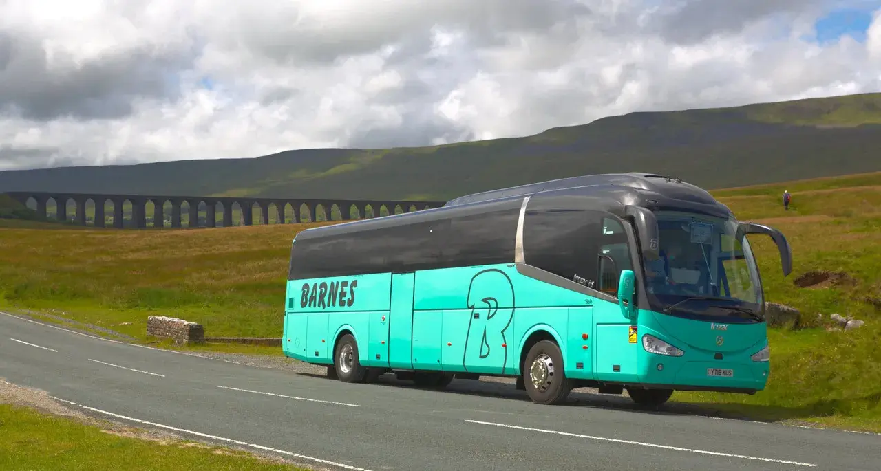 Coach in hills